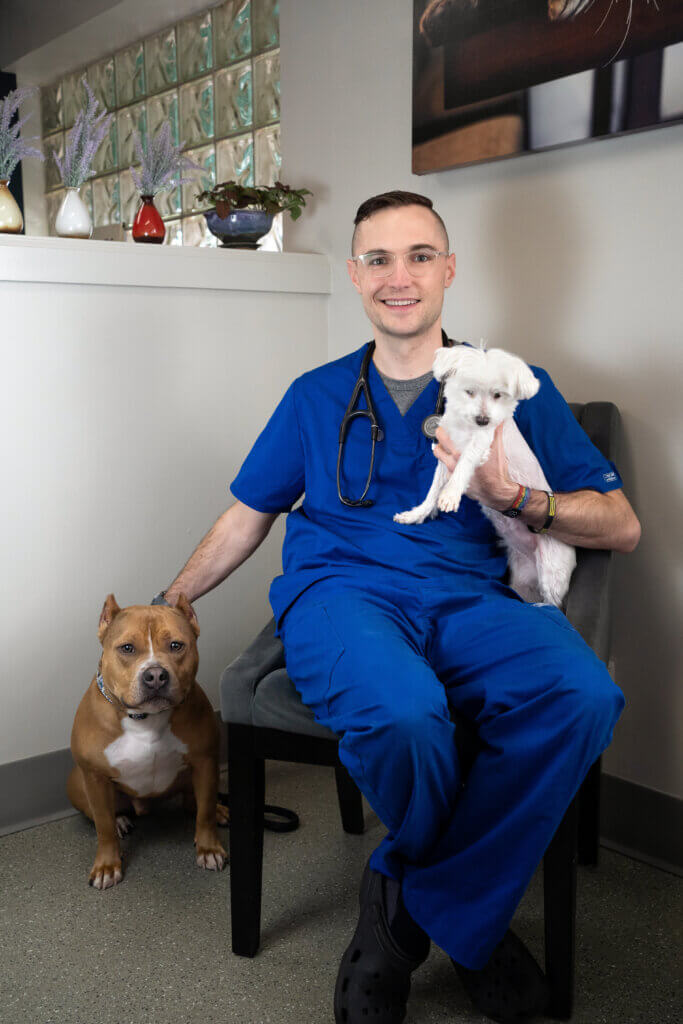Dr. Greg Thompson with two of his dogs